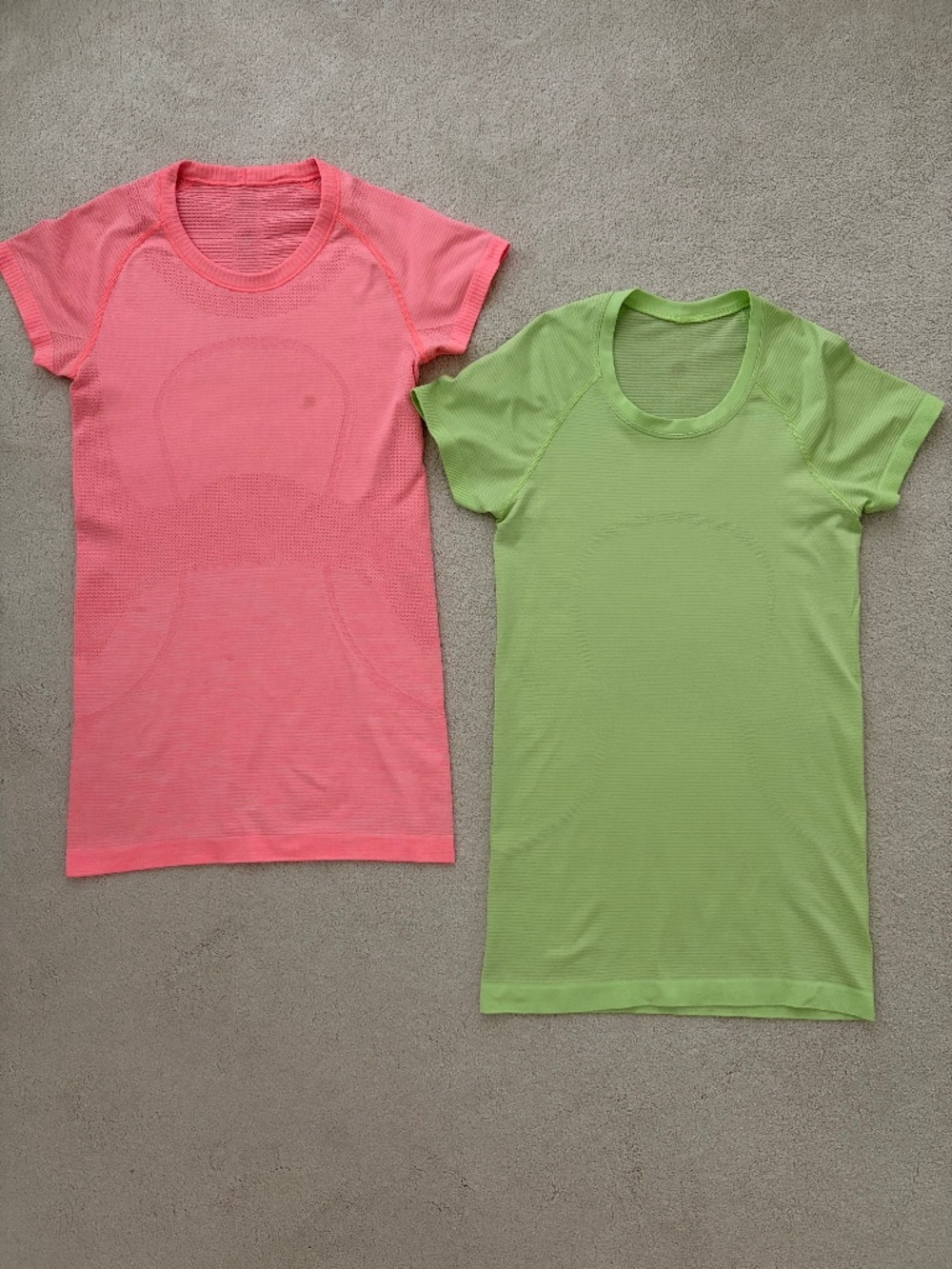 Two Lululemon size 4 swiftly tees
